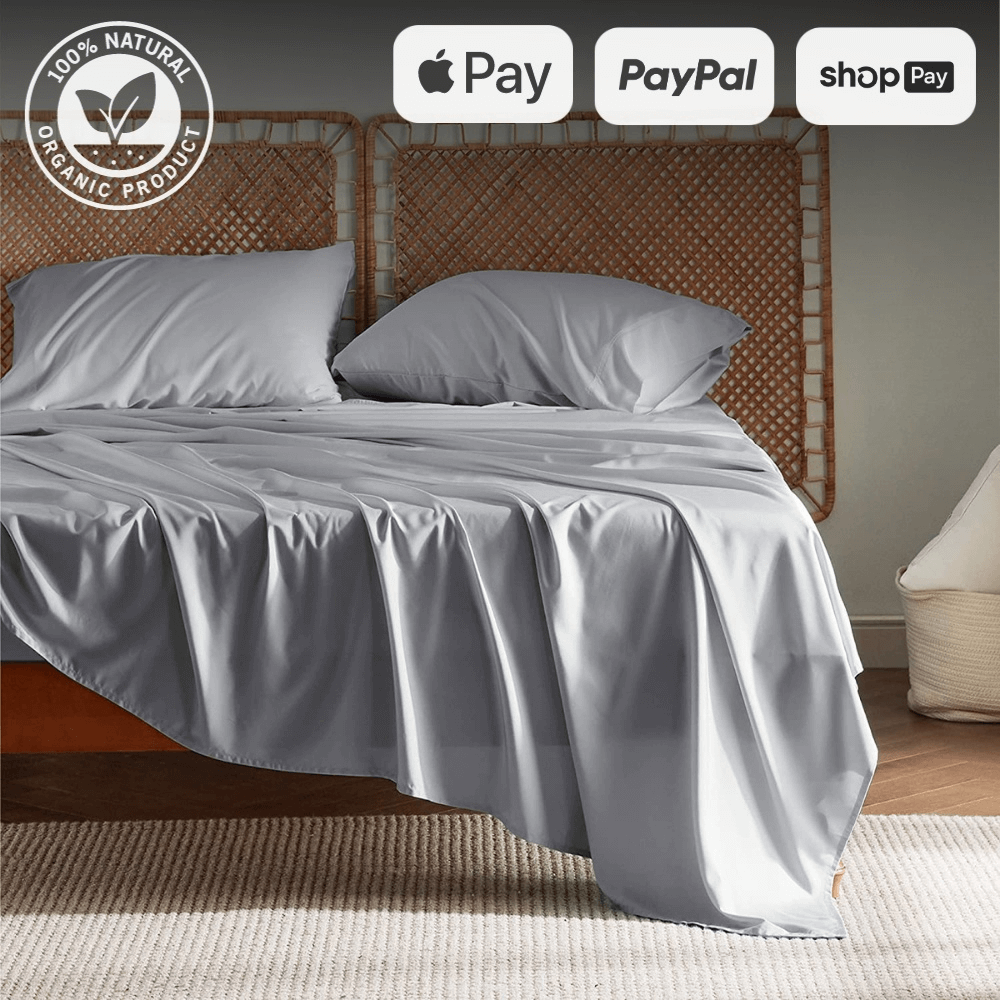 Single sheet and duvet set in grey, certified 100% natural organic product with Apple Pay, PayPal, and Shop Pay logos above the bed.