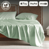 Organic single sheet and duvet set in green on a bed with payment options Apple Pay, PayPal, and Shop Pay shown.