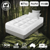 Comfortable bed with a plush white Bamboo Mattress Topper in a natural setting, highlighting features such as 100% natural organic product, 5cm of plush filling, eco-friendly, 3-year warranty, made in Australia, and free shipping. Payment options include Apple Pay, PayPal, and Shop Pay.