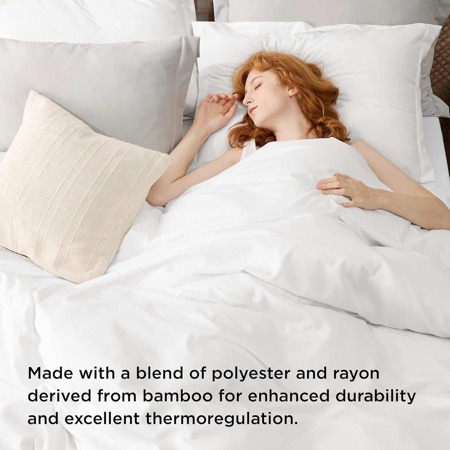 A woman with red hair sleeps peacefully in a bed with white sheets and a beige pillow. The text at the bottom reads: 'Made with a blend of polyester and rayon derived from bamboo for enhanced durability and excellent thermoregulation.