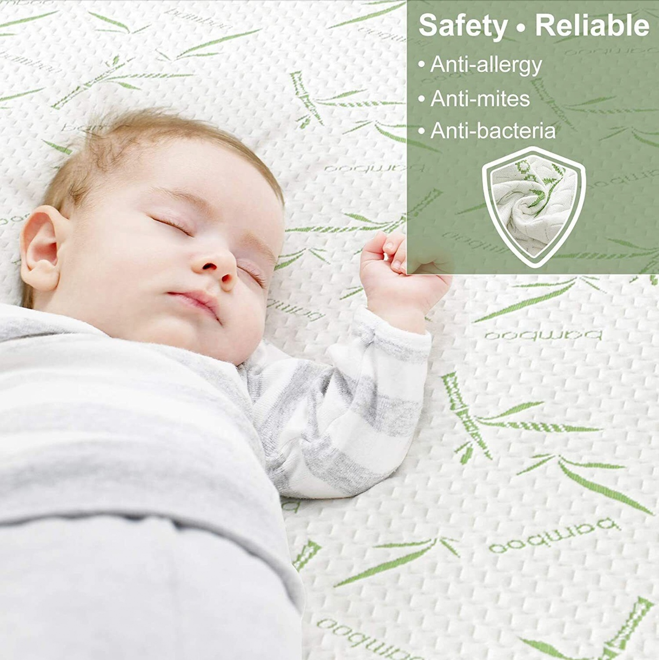 Infant sleeping peacefully on Adorearth™ bamboo mattress protector with anti-allergy, anti-mites, and anti-bacteria features