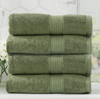 Adorearth™ organic bamboo towels in green, neatly folded in a stack, offering a luxurious and eco-friendly bath experience